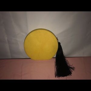 Circular yellow handbag